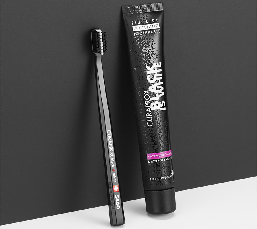 Отбеливающая зубная паста Curaprox Black Is White + зубная щетка Curaprox 8760, черная