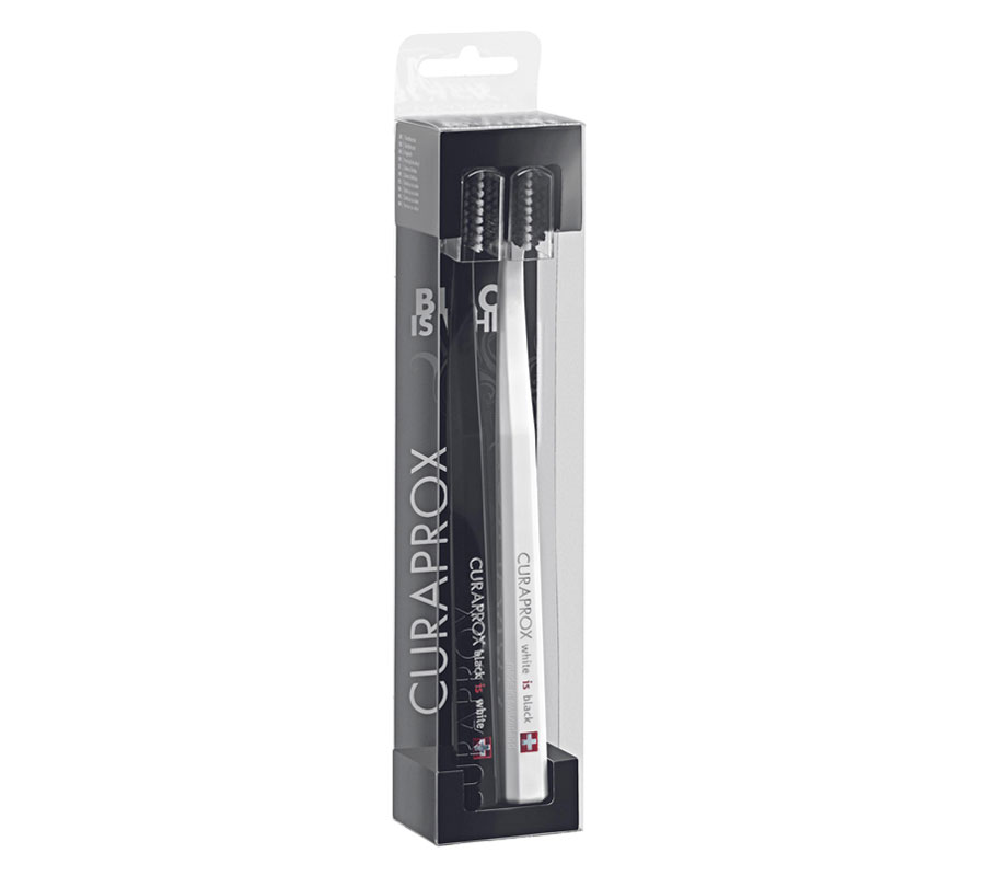 Набор ультрамягких зубных щеток Curaprox Black is White 8760 черная\белая, (2шт.) Набор ультрамягких зубных щеток Curaprox Black is White 8760 черная\белая, (2шт.)